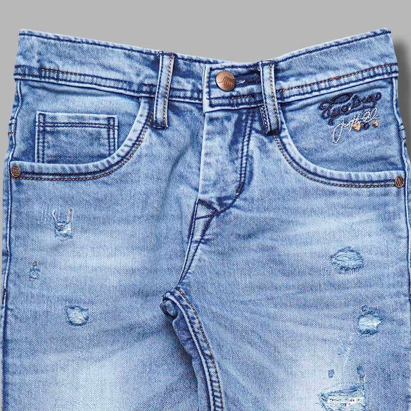 Blue Ripped Pattern Boys Jeans Close Up