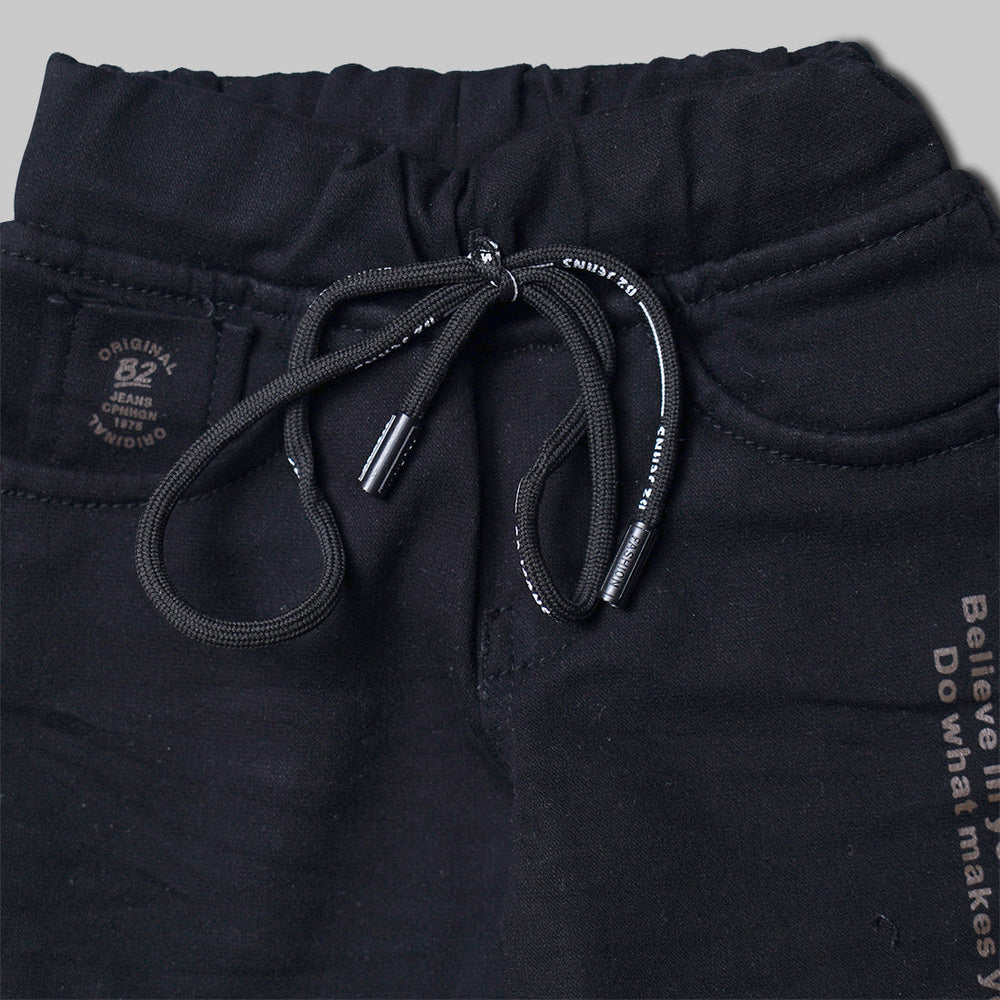 Black Drawstring Boys Jeans Close Up