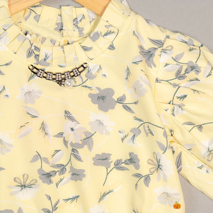Kids Top with Floral Designs Close Up View