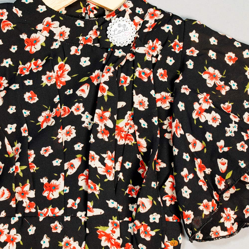 Kids Top with Floral Patterns Close Up View